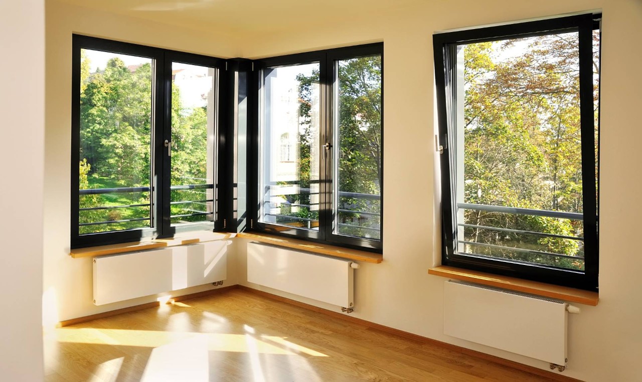Two windows, including one in the corner that need window treatments near Kennebunk, ME